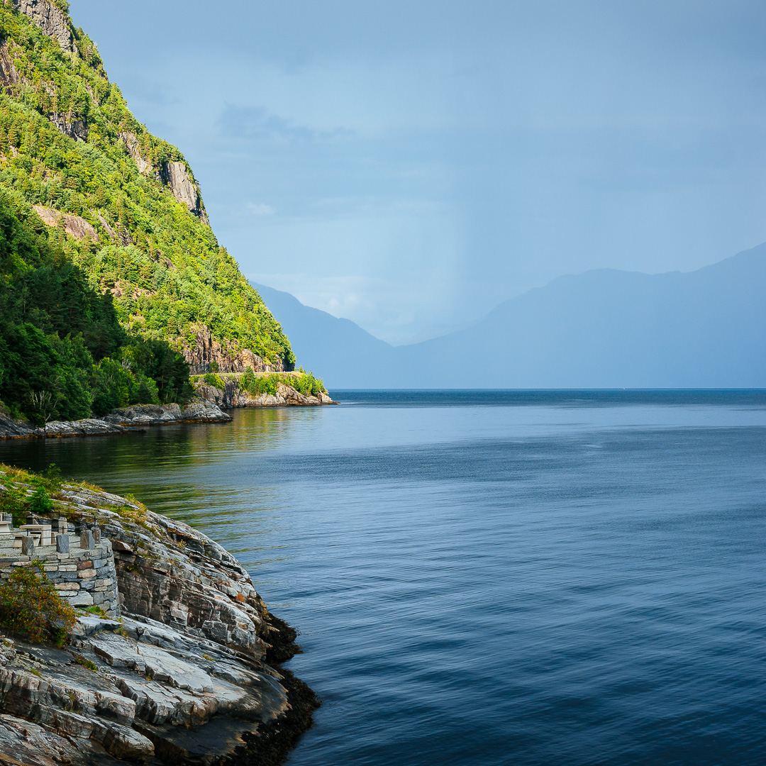 Showery Hardangerfjord by Adam Lack