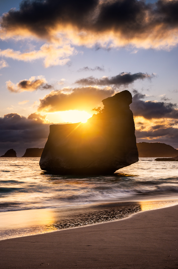 Sunrise over the rock by Adam Lack